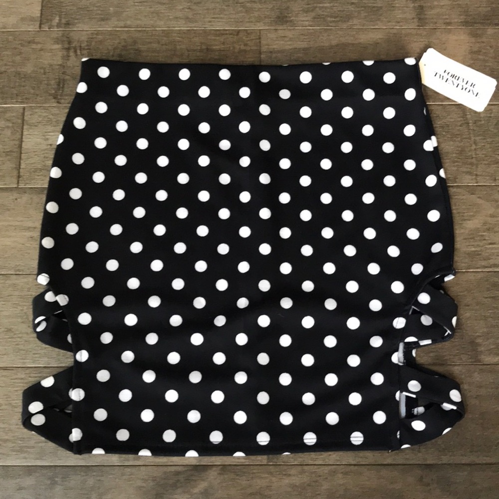 Polkadot miniskirt with side cut outs